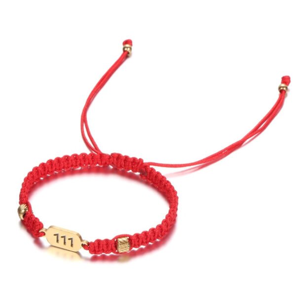 Angled view of the 111 angel number bracelet showing the braided cord and gold accent beads