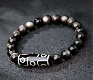11_1445x_a65eb695-9c3c-4a87-85b1-7794af2cb659 Black obsidian bead bracelet with black-and-silver patterned tube centerpiece