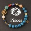 Zodiac energy bracelet for Pisces with blue beads, gold ring charm, star charm