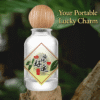 Lucky charm fragrance mist bottle with wooden cap and red square label