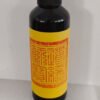 Ritual mist fragrance bottle with black cap and yellow label