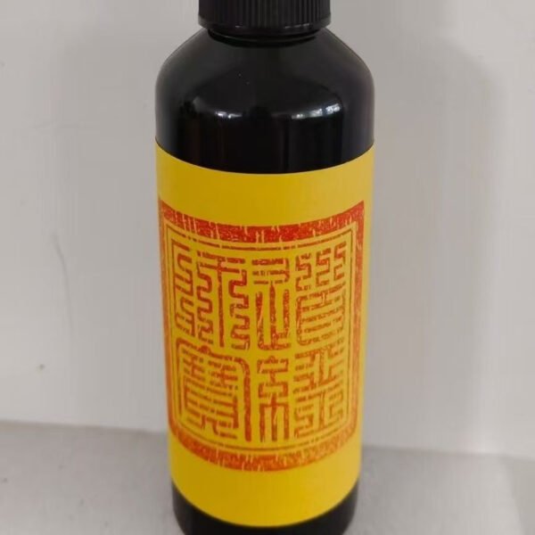 Ritual mist fragrance bottle with black cap and yellow label