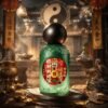 Green ritual mist bottle with round black cap and colorful front label