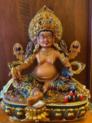 Handcrafted Yellow Dzambhal Brass Statue – Nepalese Style Tibetan Buddhist Deity with Painted Back Panel (9 inch)